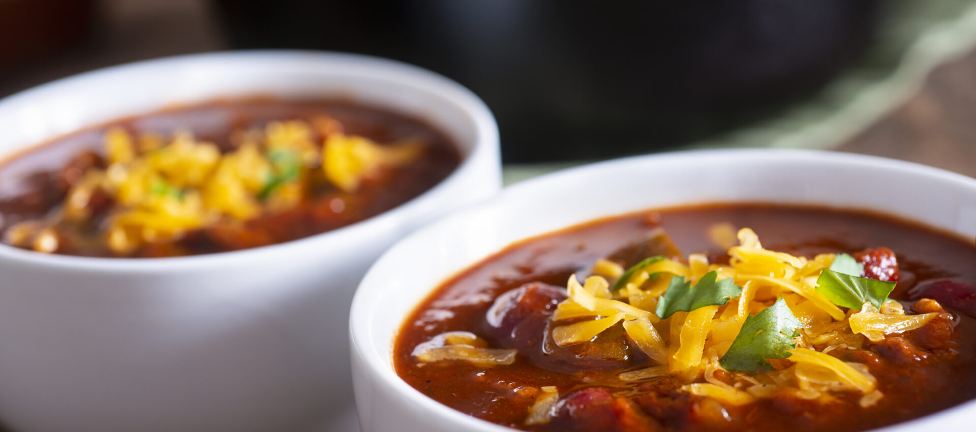 Homemade Chili Recipe with Cilantro and Cheddar Cheese