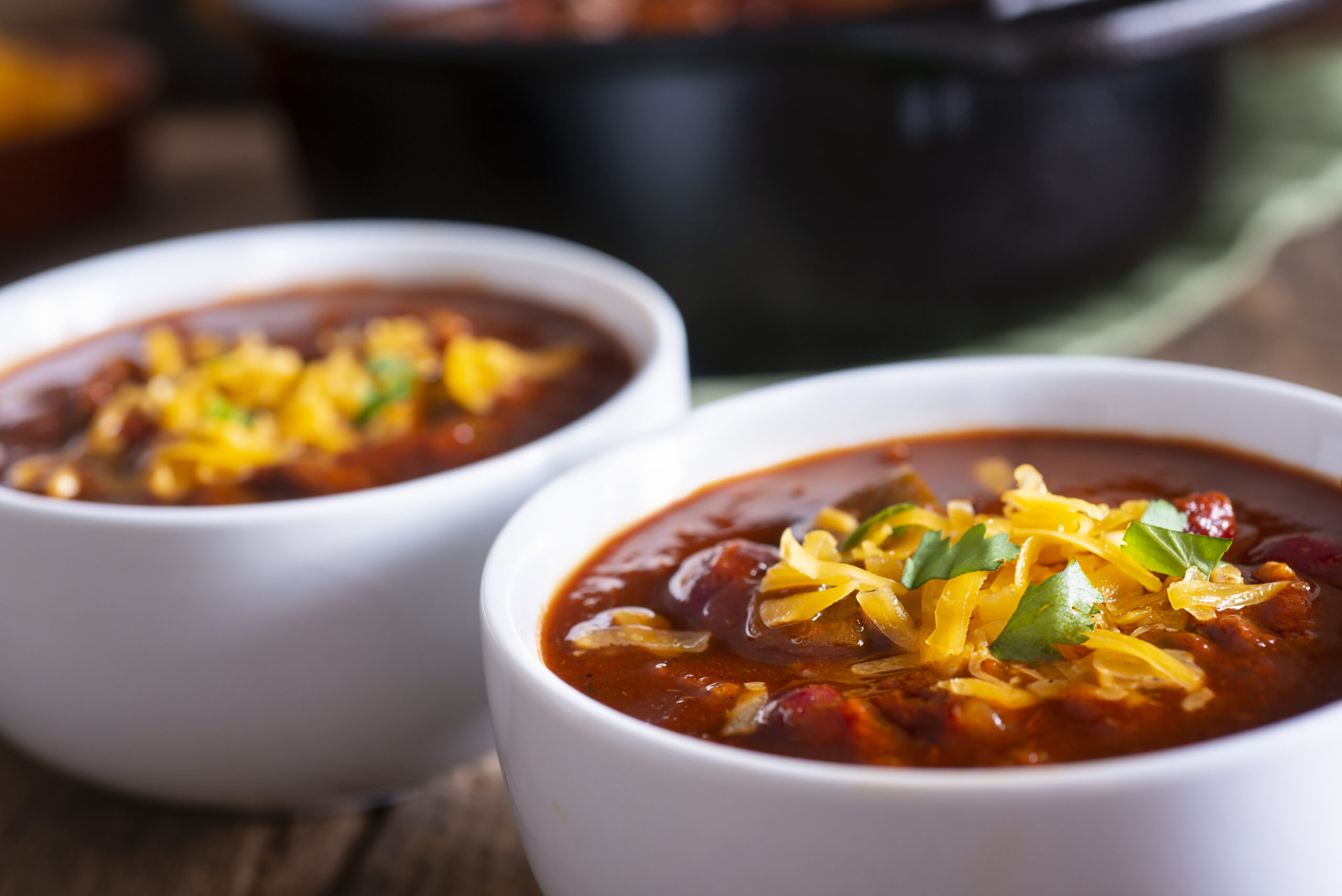 Homemade Chili Recipe with Cilantro and Cheddar Cheese