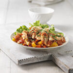 Plate of chicken with pepper salsa