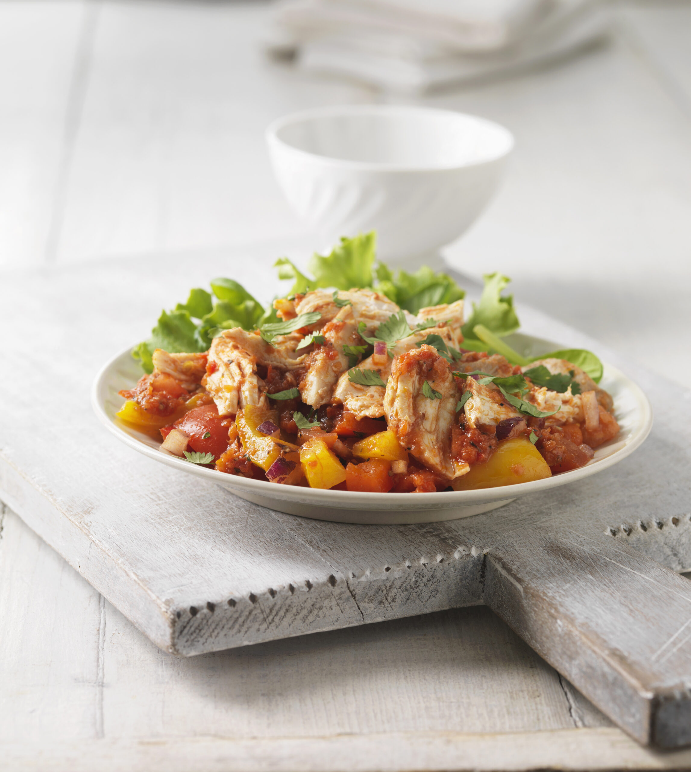 Plate of chicken with pepper salsa